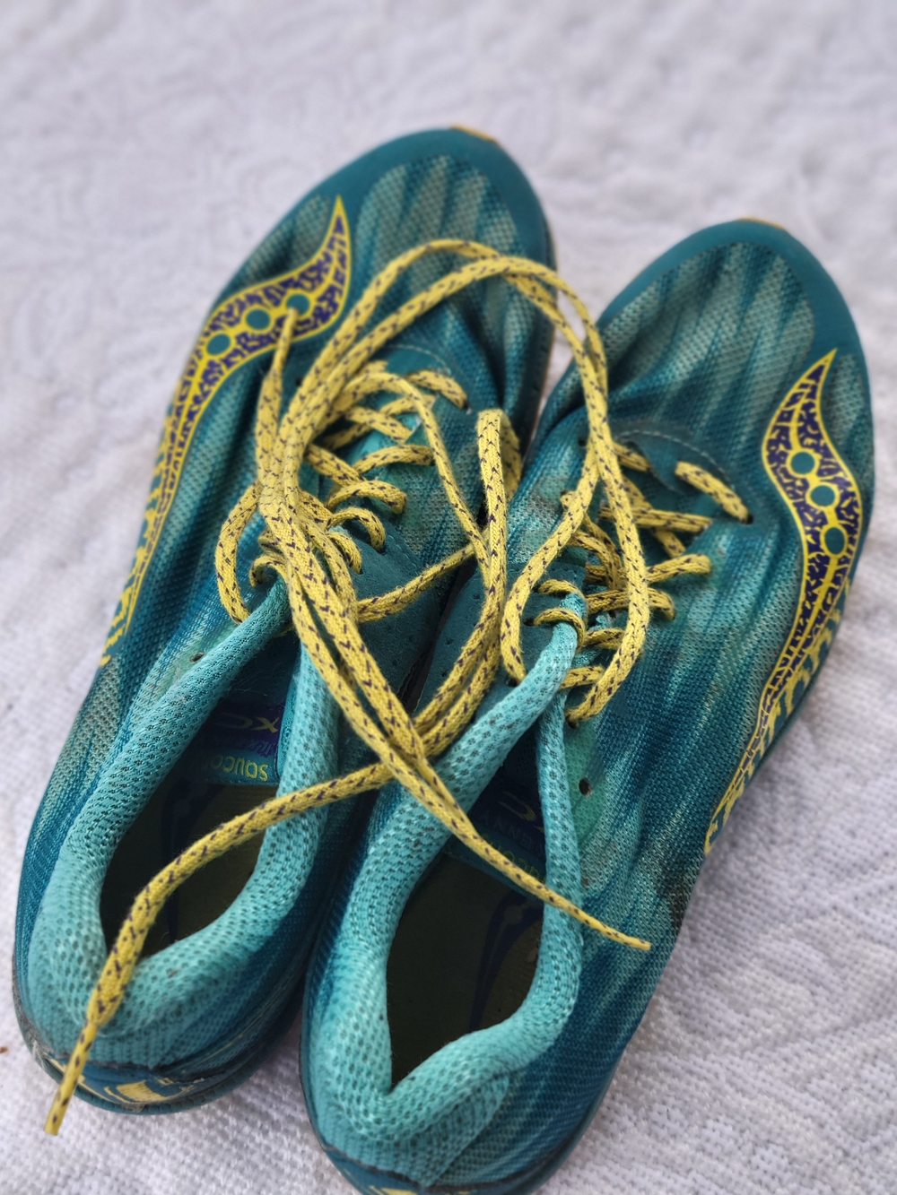 SAUCONY teal and yellow women's athletic shoes Spikes 7.5